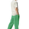 wild peach clothing | Green confetti track pants | Right back view