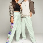 wild peach clothing design 06 honeydew green track pants front 3